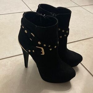 G by Guess Black Heeled Boots with Gold Accents